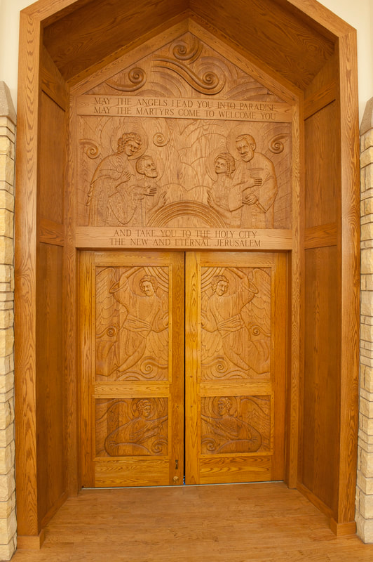 Hand carved liturgical doors and furnishings, Montana, Parish Design